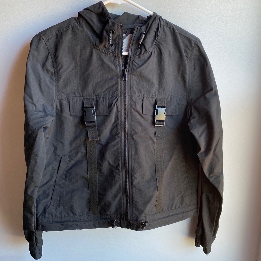 Black tactical windbreaker jacket
